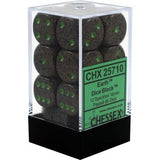 A clear rectangular display case with a black base holds dark gray, black-speckled six-sided dice with bright green pips. The green label reads “CHX 25710,” “Earth Dice Block” and “CHESSEX.”