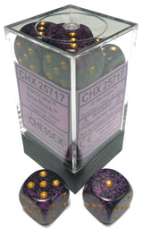 A clear rectangular case holds purple and charcoal speckled six-sided dice with gold pips; two matching dice sit in front. The lavender label reads “CHX 25717” and “CHESSEX.”