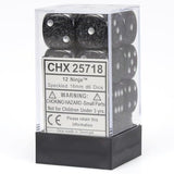 Twelve black and gray speckled six-sided dice with white pips are stacked inside a clear rectangular display case with a black base. The front label reads “CHX 25718” and “12 Ninja™.”