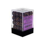 A clear display box with a black base holds dark purple, speckled six-sided dice with gold-orange pips. The purple label reads “CHX 25917,” “Hurricane,” and “CHESSEX.”
