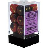 A clear cube case on a black base holds red and dark purple dice with gold pips. The purple label reads “CHX 26626” and “CHESSEX.”