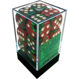 Red and dark green marbled six-sided dice with white pips are stacked inside a clear display cube with a black base. A green label on the front reads “CHX 26631.”