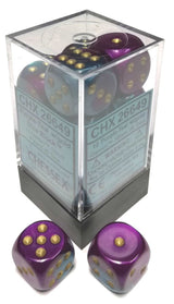 Purple and teal marbled six-sided dice with gold pips are shown inside a clear square display case, with two loose dice in front. The case label prominently reads “CHX 26649” and “CHESSEX.”