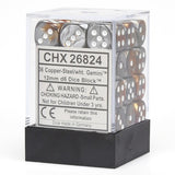A clear rectangular display case with a black base holds rows of rounded six-sided dice marbled in copper and steel gray, with white pips. The front label reads “CHX 26824” and “36 Copper-Steel/wht. Gemini.”