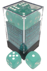 Frosty teal six-sided dice with white pips are shown inside a clear square display box, with two loose dice in front. The box label prominently reads “CHX 27605” and “CHESSEX.”
