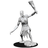 Gray unpainted Stone Giant miniature posed on a black oval base, leaning forward with one arm extended and the other raising a large rough stone club. The figure wears a draped garment with rocky details on its shoulders and stands on sculpted rocky ground.