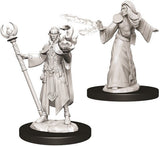Two unpainted gray male elf wizard miniatures are shown on separate black round bases: one holds a tall staff and raises a hand with a curling magical effect, while the other wears flowing robes and extends both arms beneath a translucent-looking spell effect.