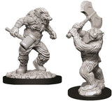 Two unpainted gray fantasy miniatures on black oval bases: a muscular wereboar in clothing grips a short weapon, while a werebear raises a large axe overhead. Both have detailed sculpted fur and rugged poses.
