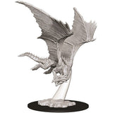 Gray unpainted young bronze dragon miniature with a scaled body, horns, tail, and large veined wings spread wide, shown flying above a rocky base on a clear support attached to a black round stand.