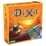 Orange-and-yellow Dixit board game box shown at an angle, with the front, spine and top visible. The front features a whimsical floating boat in a surreal illustrated landscape, the title “Dixit,” and the slogan “A picture is worth a thousand words!”