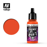 Bright orange Vallejo Game Air paint bottle with a tall black dropper cap beside a round orange color swatch on a white background. The label reads “GAME Air” and “vallejo.”