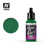 A small green Vallejo Game Air paint bottle with a tall black ribbed dropper cap stands beside a large dark green circular color swatch. The purple-and-black label reads “GAME Air” and “vallejo,” with small lettering on the white band partly cropped.