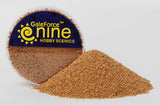 A mound of fine tan basing grit sits in front of a clear round container holding more grit. The dark blue and yellow label reads “GaleForce nine” and “HOBBY SCENICS.”