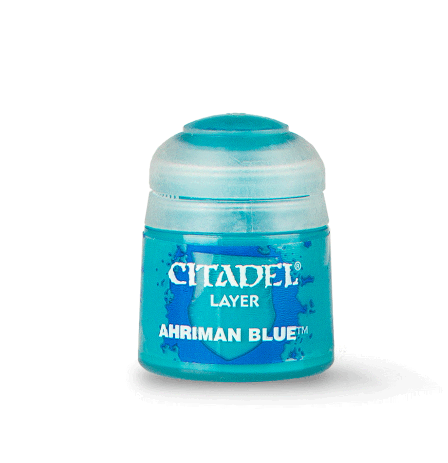 A turquoise-blue Citadel paint pot with a rounded white lid stands against a muted green background, casting a soft shadow. Its front label reads “CITADEL,” “LAYER,” and “AHRIMAN BLUE.”