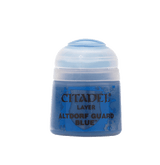 A small blue paint pot with a rounded white flip-top lid, shown upright against a plain background. Its label reads “CITADEL,” “LAYER,” and “ALTDORF GUARD BLUE.”