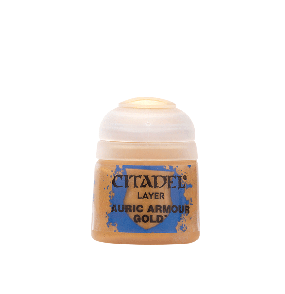 A small paint pot with a rounded white flip-top cap and a gold-colored label with blue splashes. The label reads “CITADEL,” “LAYER,” and “AURIC ARMOUR GOLD.”