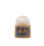 A squat ochre-brown paint pot with a rounded white flip-top lid stands against a solid dark green background. Its blue-and-brown label reads “CITADEL,” “LAYER,” and “BALOR BROWN.”