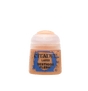 A squat paint pot with a translucent peach-colored cap and a tan label splashed with blue. The label reads “CITADEL,” “LAYER,” and “BESTIGOR FLESH.”