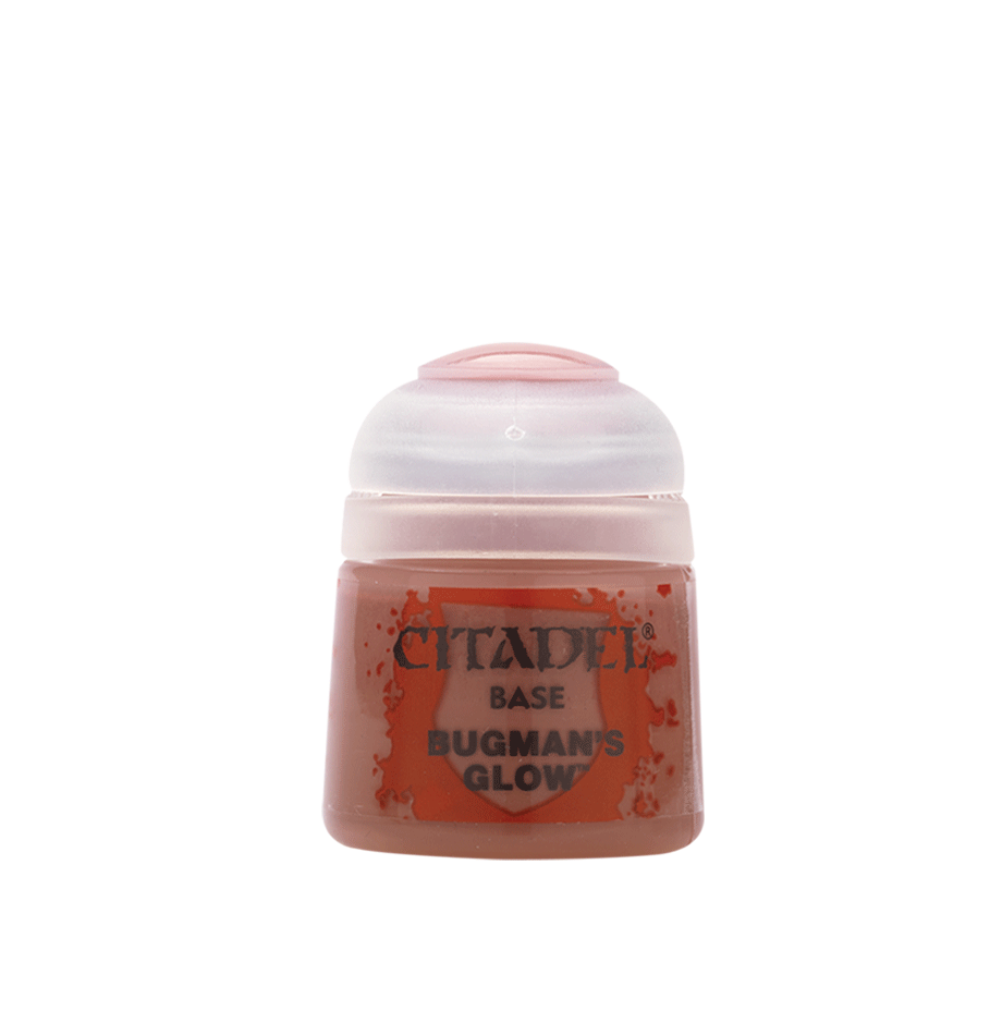A small paint pot with a pale pink cap and dusty rose-brown paint visible through the translucent body. The front label reads “CITADEL,” “BASE,” and “BUGMAN’S GLOW.”