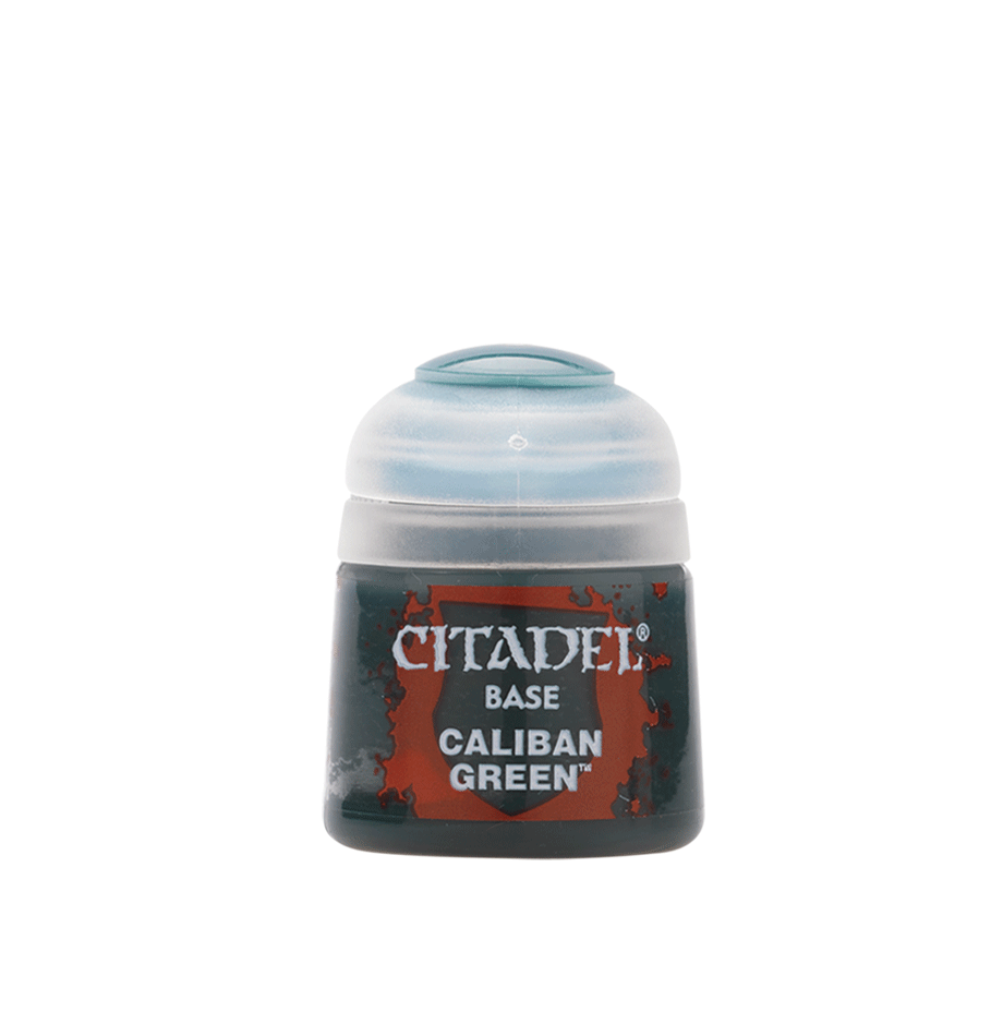 A small, squat Citadel paint pot stands upright with a dark body, red-and-black label, and pale translucent domed cap. The label reads “CITADEL,” “BASE,” and “CALIBAN GREEN” in white lettering.