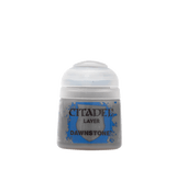 A small pot of gray Citadel layer paint with a white flip-top lid and a blue label. The label reads “CITADEL,” “LAYER,” and “DAWNSTONE.”