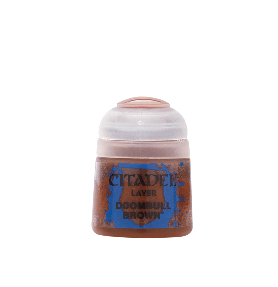 Small brown paint pot with a pale pinkish-white flip-top lid and a blue, brown-speckled label reading “CITADEL,” “LAYER,” and “DOOMBULL BROWN.”
