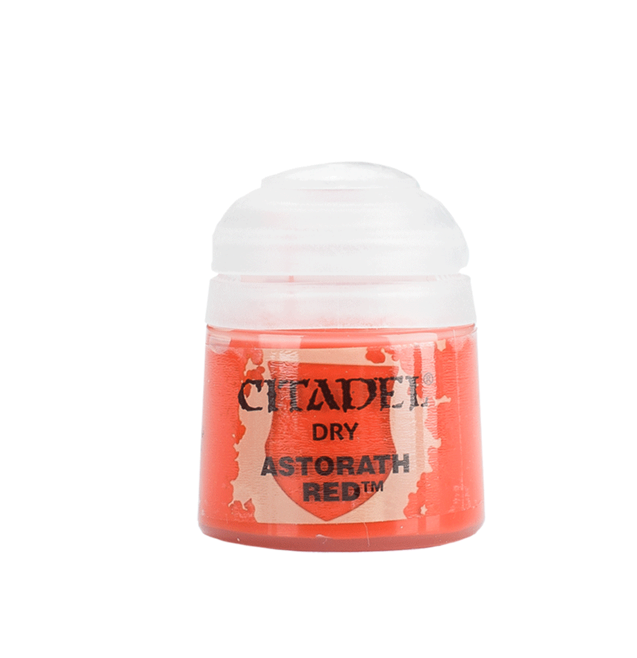 A small squat pot of vivid coral-red paint with a rounded white lid. The front label shows a red shield graphic and the black text “CITADEL,” “DRY,” and “ASTORATH RED.”