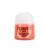 A small squat pot of vivid coral-red paint with a rounded white lid. The front label shows a red shield graphic and the black text “CITADEL,” “DRY,” and “ASTORATH RED.”