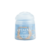 A small Citadel dry paint pot stands upright against a plain background, with a white domed cap and a light blue label featuring a tan shield graphic. The label reads “CITADEL,” “DRY,” and “CHRONUS BLUE.”