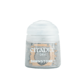 A small clear paint pot with a white domed cap and gray paint visible inside, shown upright against a plain background. Its label reads “CITADEL,” “DRY,” and “DAWNSTONE.”