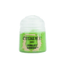 A small pot of bright green Citadel paint stands upright with a rounded white cap. The beige label reads “CITADEL,” “DRY,” and “NIBLET GREEN.”