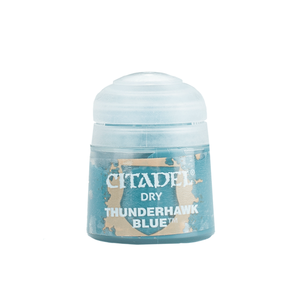 A squat Citadel paint pot with a rounded white lid and a blue label mottled with tan. The label reads “CITADEL,” “DRY,” and “THUNDERHAWK BLUE.”