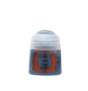 A small gray-blue paint pot with a pale translucent cap stands against a muted green background. Its orange-and-blue label reads “CITADEL,” “BASE,” and “THE FANG.”