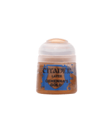 A small paint pot with a translucent white flip-top lid and a blue-and-gold splatter label. The label reads “CITADEL,” “LAYER,” and “GEHENNA’S GOLD.”