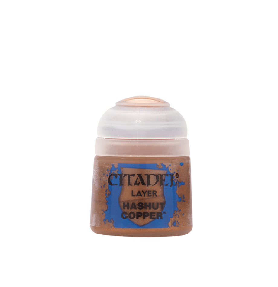 Front view of a small Citadel paint pot with a white cap and copper-brown contents visible through the lower container. Its blue-and-copper label reads “CITADEL,” “LAYER,” and “HASHUT COPPER.”
