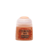 Small orange Citadel paint pot shown upright against a plain background, with a pale flip-top cap and an orange paint-splatter label reading “CITADEL,” “BASE,” and “JOKAERO ORANGE.”