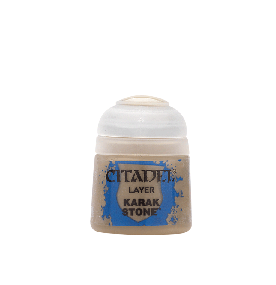 A small paint pot with a white flip-top lid and beige paint visible through the lower container. Its blue-and-tan label reads “CITADEL,” “LAYER,” and “KARAK STONE.”