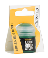 A small translucent green-tinted bottle of modeling putty sits in a white-and-yellow display package. The black bottle label reads “CITADEL” and “LIQUID GREEN STUFF,” with “LIQUID GREEN STUFF” printed vertically on the yellow package panel.