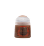 A squat brown paint pot with a wide white flip-top cap, shown upright against a muted green background. The front label has a red-brown shield design and the text “CITADEL,” “BASE,” and “MOURNFANG BROWN.”