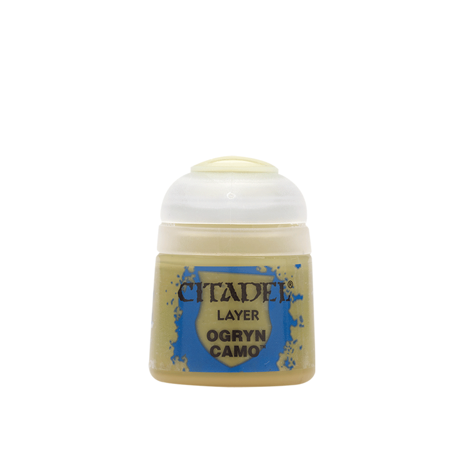 A small squat paint pot with a rounded white flip-top lid and a tan label with blue splashes. The label reads “CITADEL,” “LAYER,” and “OGRYN CAMO.”
