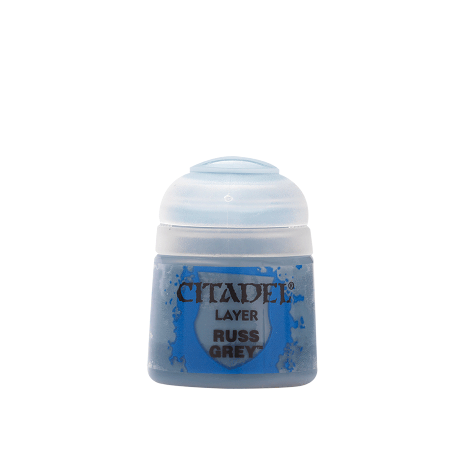 A small blue-gray Citadel paint pot with a rounded white flip-top cap, shown upright against a plain background. Its label reads “CITADEL,” “LAYER,” and “RUSS GREY.”