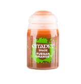 A small squat pot of orange shade paint stands upright against a dark green background, with a translucent orange body, white flip-top cap, and green-and-brown label reading “CITADEL,” “SHADE,” and “FUEGAN ORANGE.”