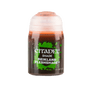 A small upright Citadel shade paint pot with a white cap and dark reddish-brown liquid. Its green-and-black label reads “CITADEL,” “SHADE,” and “REIKLAND FLESHSHADE.”