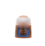 A small brown paint pot with a pale translucent cap and a blue-edged label against a solid green background. The label reads “CITADEL,” “LAYER,” and “SKRAG BROWN.”