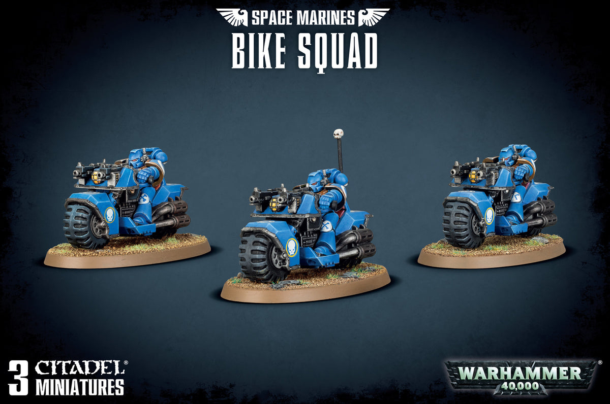 Three blue-armored Space Marine riders on futuristic motorcycles, each mounted on a round textured base, shown from front three-quarter angles against a dark background. The heading reads “SPACE MARINES BIKE SQUAD,” with “3 CITADEL MINIATURES” and “WARHAMMER 40,000” below.