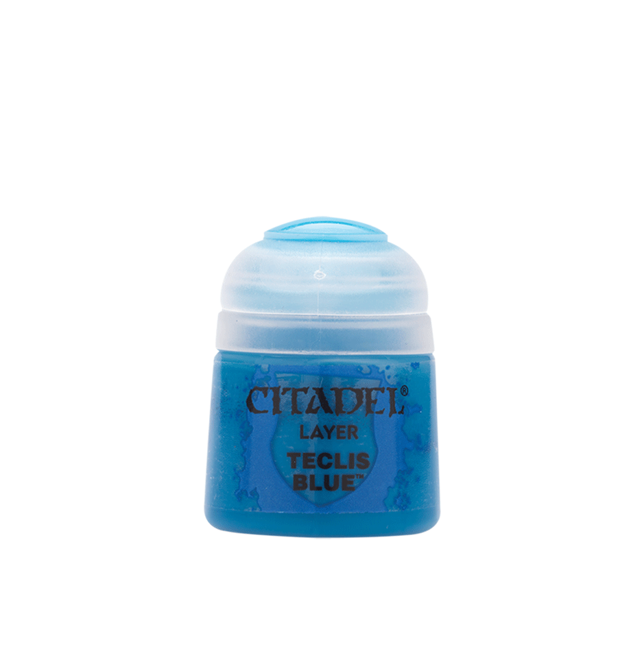 A small blue Citadel paint pot with a translucent white flip-top lid, shown upright against a plain background. Its label reads “CITADEL,” “LAYER,” and “TECLIS BLUE.”