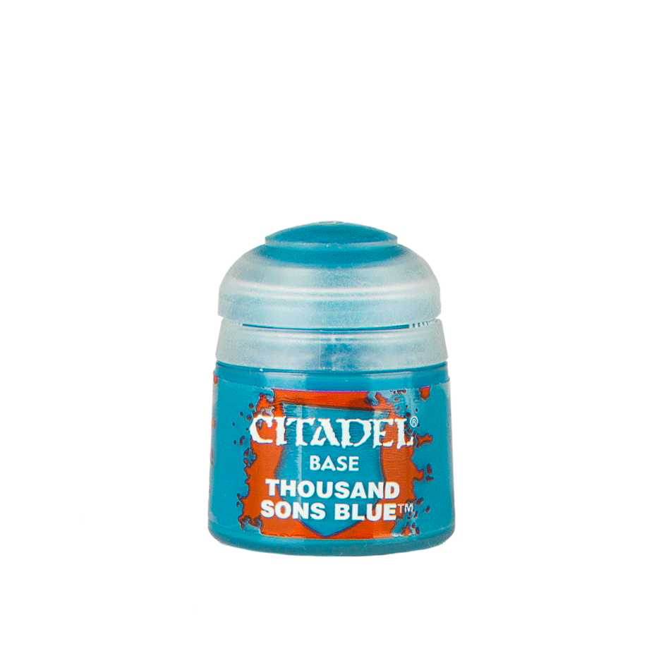 A small turquoise Citadel paint pot with a translucent pale blue cap, shown upright against a plain background. Its orange-and-blue label reads “CITADEL,” “BASE,” and “THOUSAND SONS BLUE.”