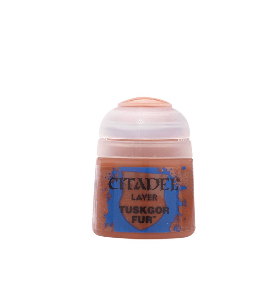 A small pot of rusty brown Citadel layer paint with a pale translucent screw-top lid. The blue front label reads “CITADEL,” “LAYER,” and “TUSKGOR FUR.”