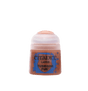 A small pot of rusty brown Citadel layer paint with a pale translucent screw-top lid. The blue front label reads “CITADEL,” “LAYER,” and “TUSKGOR FUR.”