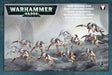 Front of the Tyranid Hormagaunt Brood box, showing a swarm of pale bone-colored, purple-headed alien creatures with long reddish scythe claws charging across grey rocky ground. The package reads “WARHAMMER 40,000” and “TYRANID HORMAGAUNT BROOD.”